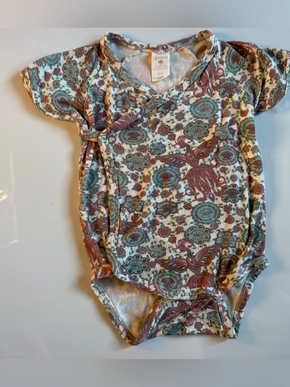 kate quinn Teal, Rust & Cream Paisley Short Sleeve Bodysuit